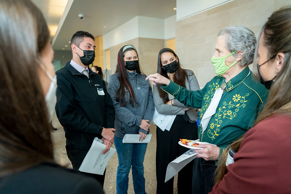 Dr. Temple Grandin, Professor in the Animal Science Department in the Collge of Agricultural Sciences at Colorado State University speaks with students during a break at the 2022 International Livestock Forum - Preparing for the Future of the Livestock and Meat Industries. January 12, 2022