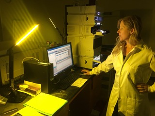 Rhodes working in her lab.