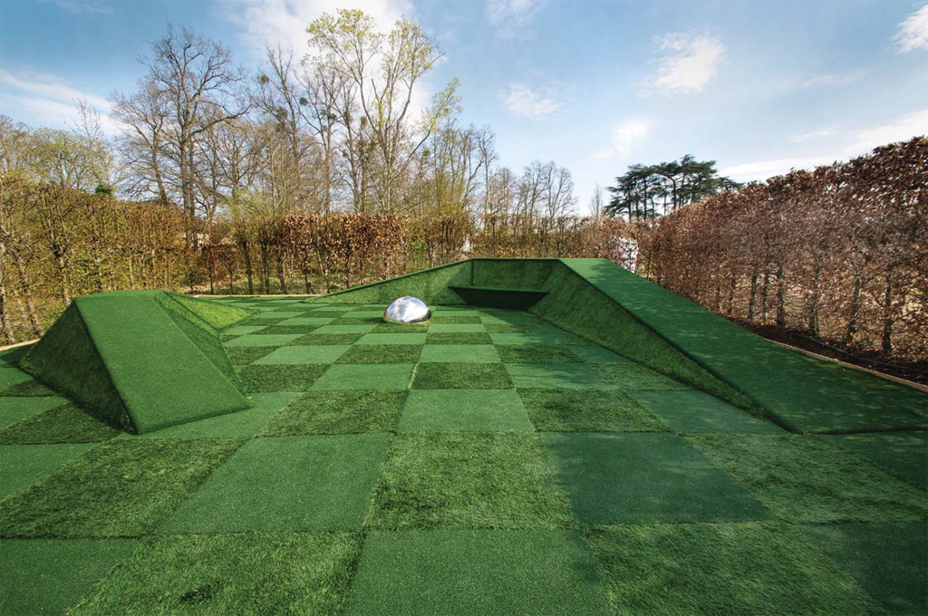 Outdoor art exhibit made of green turf