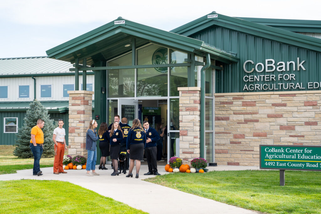 FFA students greet attendees outside the CoBank Center for Agricultural Education.